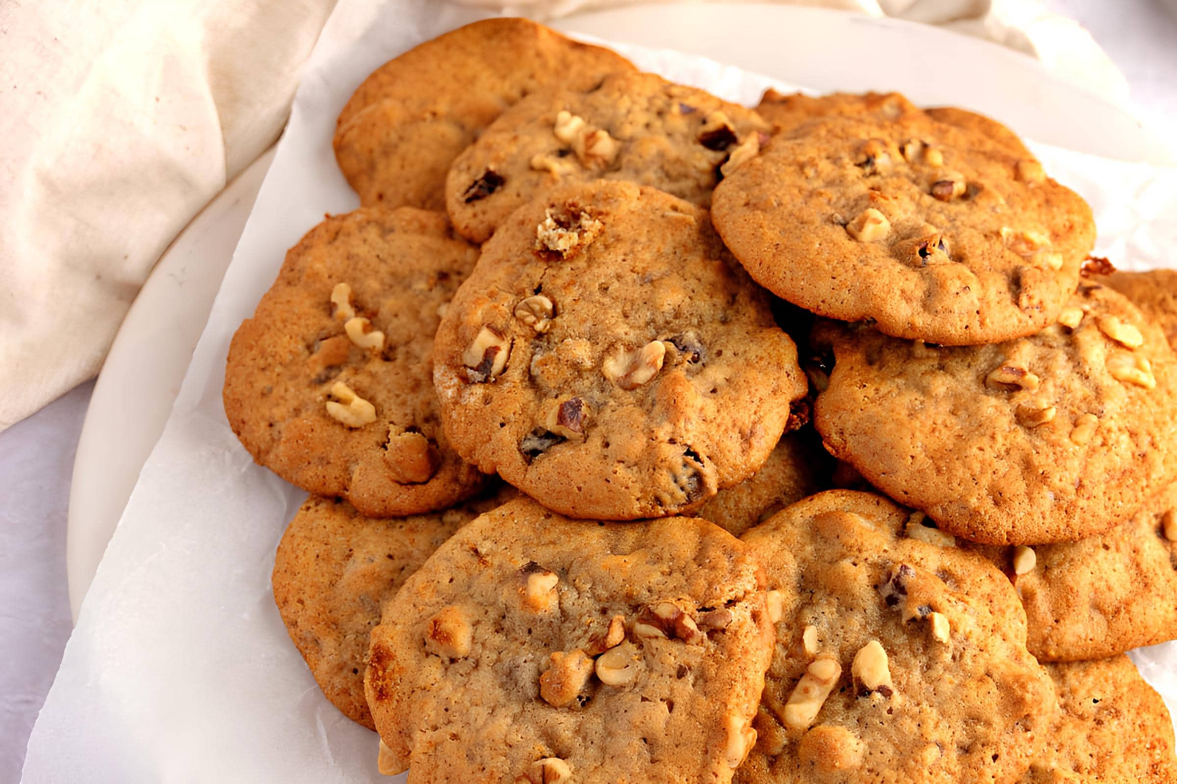 Persimmon Cookies with Nuts and Rasins in a White Plate
