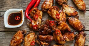 Baked Jerk Chicken Wings with BBQ Sauce and Chili