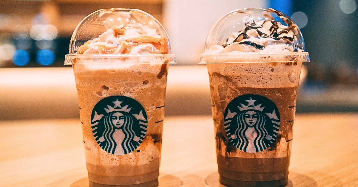 Chocolate Starbucks drinks on a wooden table.