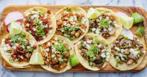 Different Types of Pork and Beef Tacos with Lime