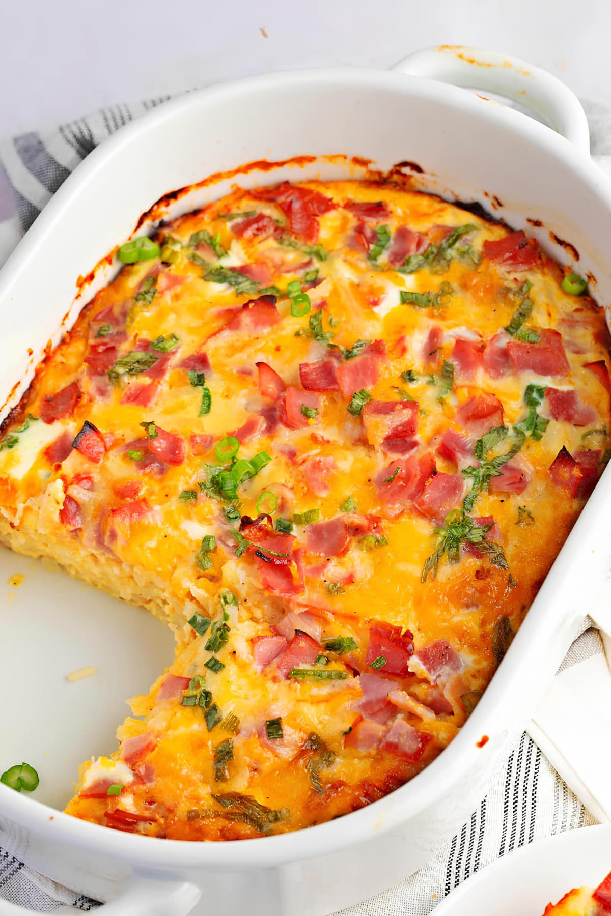 Baked Hash Browns in a Casserole with Ham, Cheese and Cilantro