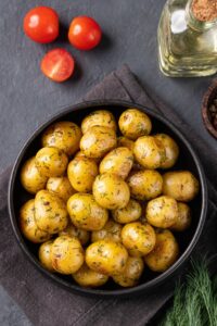 Homemade Baked Baby Potatoes Garnished with Herbs
