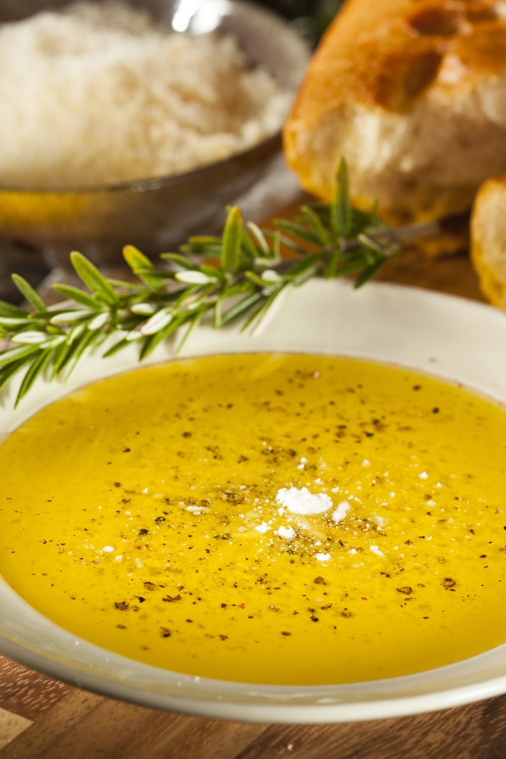 Carabba's Bread Dip Garnished With Grated Parmesan Cheese