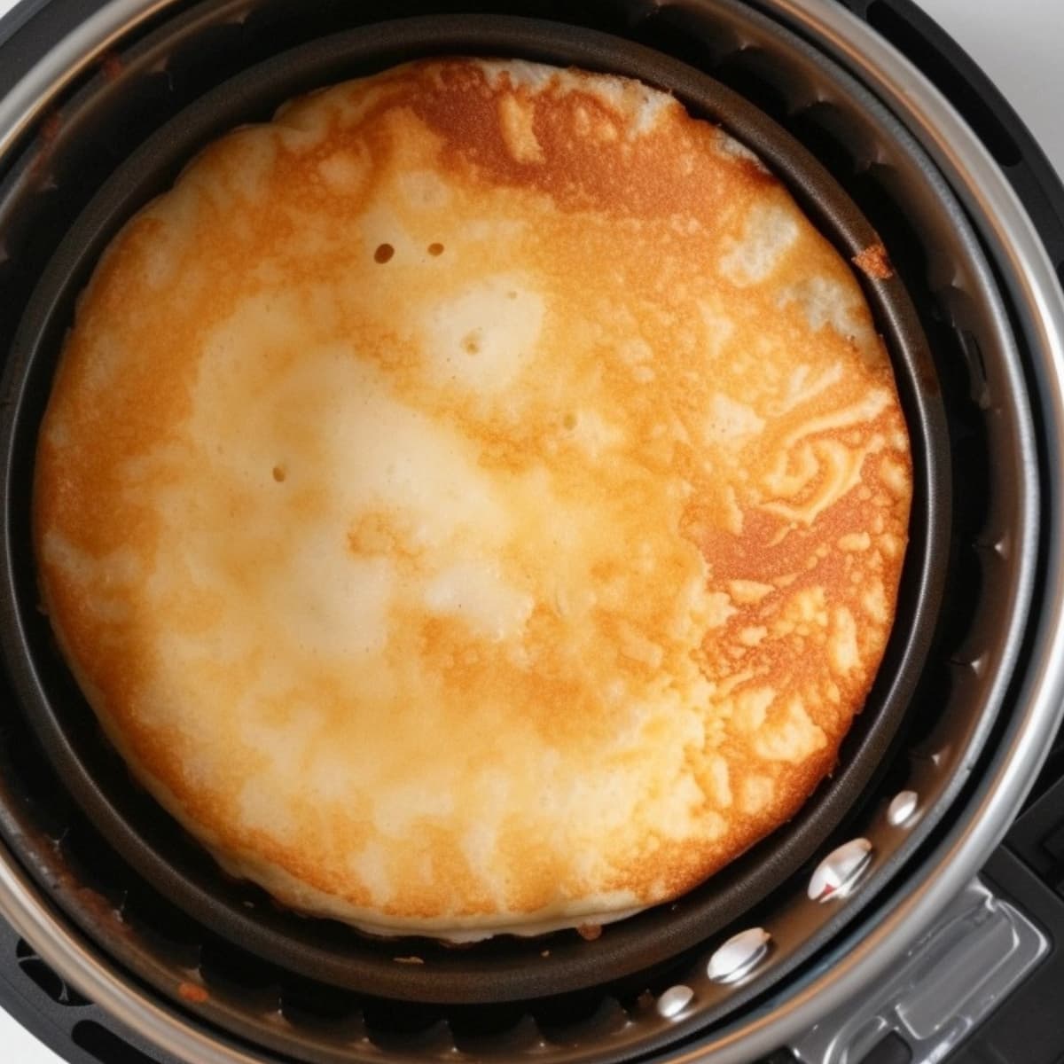 Pancake in a molder inside an air fryer