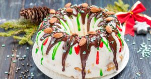 Sweet Homemade Ice Cream Cake with Nuts, Chocolate Syrup and Whipped Cream