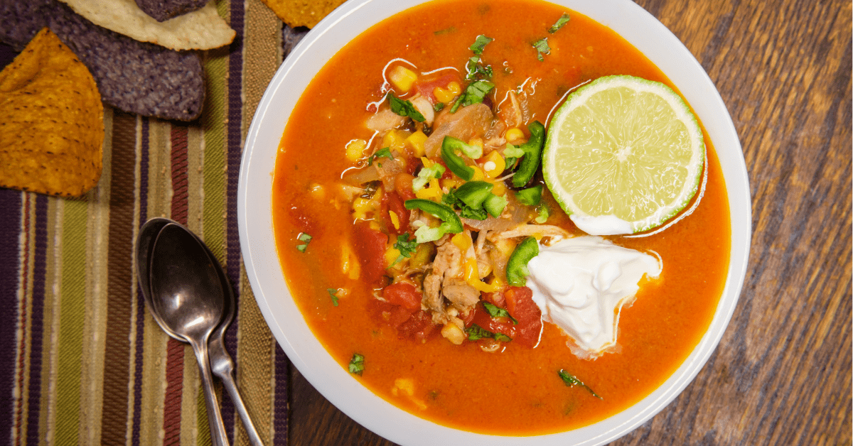 Homemade Tortilla Soup with Sour Cream and Lemon